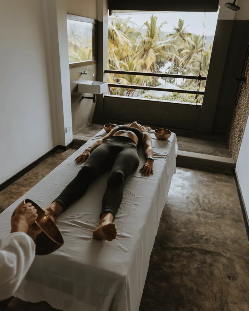 Massage treatment with palm views at Jasper House wellness retreat