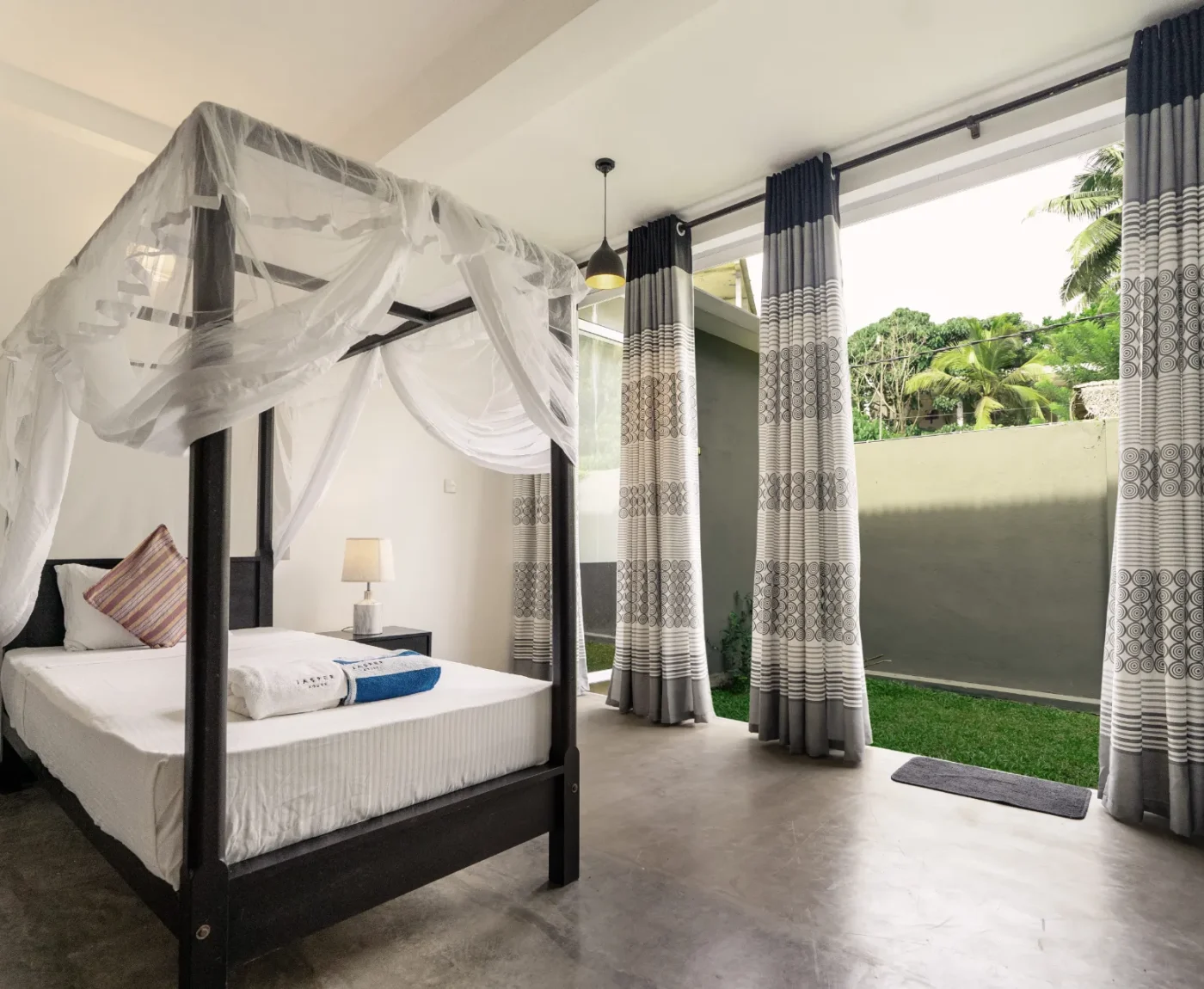 Deluxe Family Room with two four-poster beds at Jasper House Hiriketiya